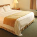 A Rosemont Suites room with king bed also features a pull out sofa and kitchenette.